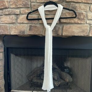 White, stretchy sheer scarf.